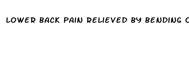 lower back pain relieved by bending over