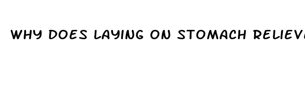 why does laying on stomach relieve back pain