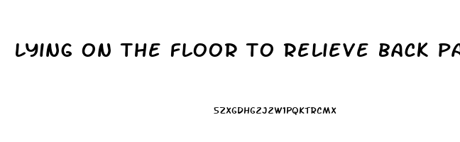 lying on the floor to relieve back pain